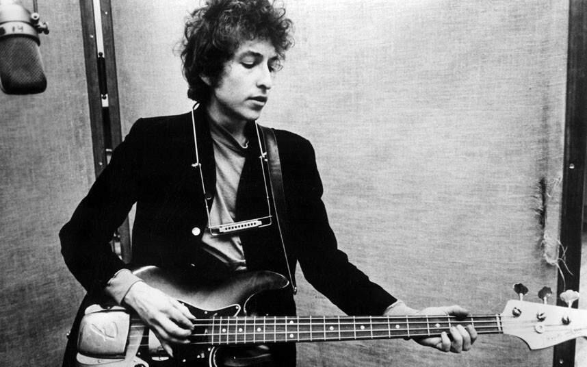 Bob Dylan, playing a Fender in the studio, circa 1965, at the Newport Folk Festival, and shown in the 1967 documentary 'Festival.' Dylan has been named the 2015 MusiCares person of the year. (Photo by Everett Collection / Rex Features)