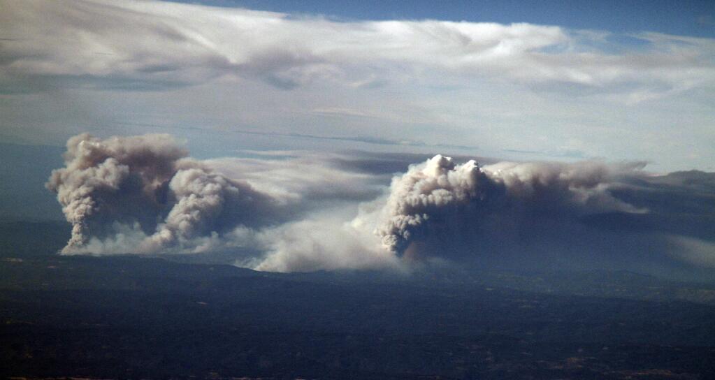 Bill Hoban/Index-TribuneThe massive King Fire in El Dorado County has grown to more than 71,000 acres as of Thursday. This image taken late Tuesday afternoon is from a plane at about 20,000 feet over Modesto.