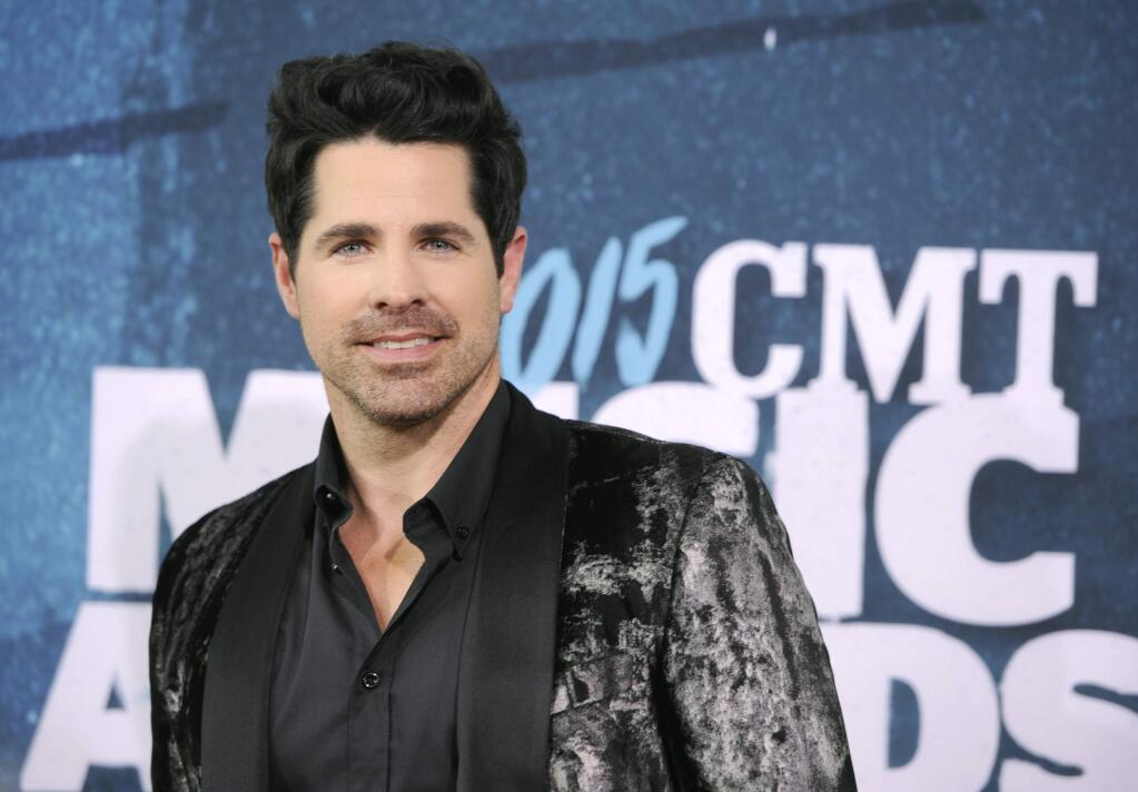 JT Hodges arrives at the CMT Music Awards at Bridgestone Arena on Wednesday, June 10, 2015, in Nashville, Tenn. (Photo by Sanford Myers/Invision/AP)