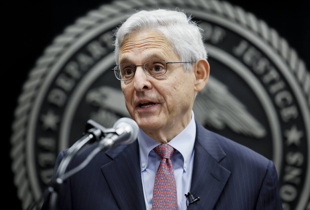 Attorney General Merrick Garland speaks during an event to swear in the new director of the federal Bureau of Prisons Colette Peters at BOP headquarters in Washington, Tuesday, Aug. 2, 2022. The Justice Department is suing Idaho, arguing that its new abortion law violates federal law because it does not allow doctors to provide medically necessary treatment, Garland said Tuesday. (Evelyn Hockstein/Pool Photo via AP)