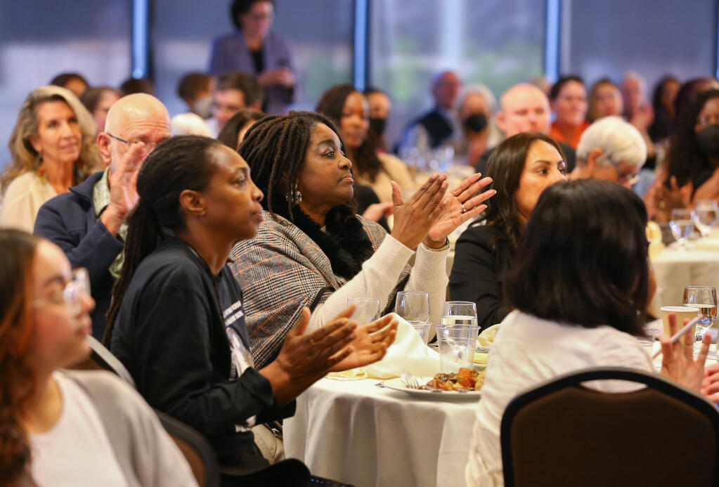 Audience members applaud the panelists during “An Honest Conversation About Anti-Blackness”, hosted by Los Cien, in Rohnert Park on Friday, January 20, 2023.  (Christopher Chung/The Press Democrat)