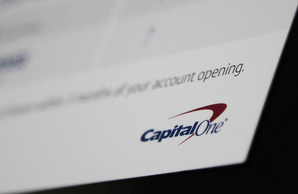 This Monday, July 22, 2019, photo shows Capital One mailing in North Andover, Mass. Capital One says a hacker got access to the personal information of over 100 million individuals applying for credit. The McLean, Virginia-based bank said Monday, July 29, 2019, it found out about the vulnerability in its system July 19 and immediately sought help from law enforcement to catch the perpetrator. (AP Photo/Elise Amendola)