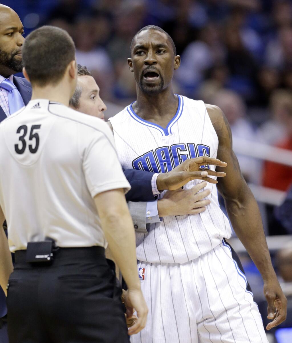 FILE - In this Jan. 31, 2015, file photo, Orlando Magic's Ben Gordon, right, talks with referee Kane Fitzgerald (35) before he was ejected in the fourth quarter of an NBA basketball game against the Dallas Mavericks, in Orlando, Fla. Former NBA player Ben Gordon has been arrested on suspicion of robbery in Los Angeles after police said he punched an apartment manager and pulled a knife. Gordon, 34, went to a building Saturday where he had rented two apartments and demanded his security deposit from the manager, police spokesman Tony Im said Tuesday, Nov. 28, 2017. When the manager said he didn't have access to the deposit money, Gordon 'punched him in the face,' Im said. (AP Photo/John Raoux, File)