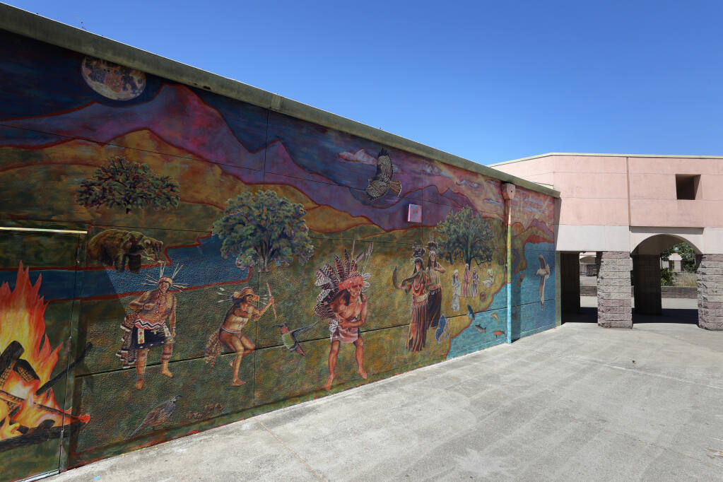 The new mural at Elsie Allen High School, on display Sunday, May 29, 2022 in Santa Rosa, California, was created with the help of Artstart and honors the Pomo culture. (Beth Schlanker/The Press Democrat)