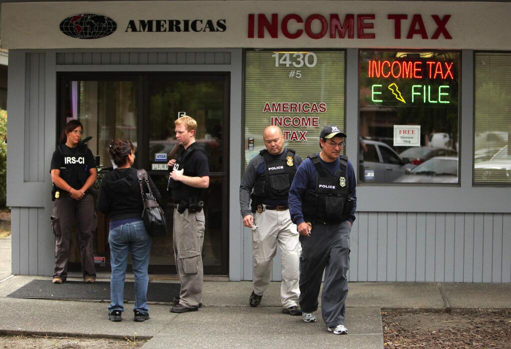 The Internal Revenue Service raided the America's Income Tax office on Guerneville Road in Santa Rosa in 2012. (JOHN BURGESS/ PD FILE)
