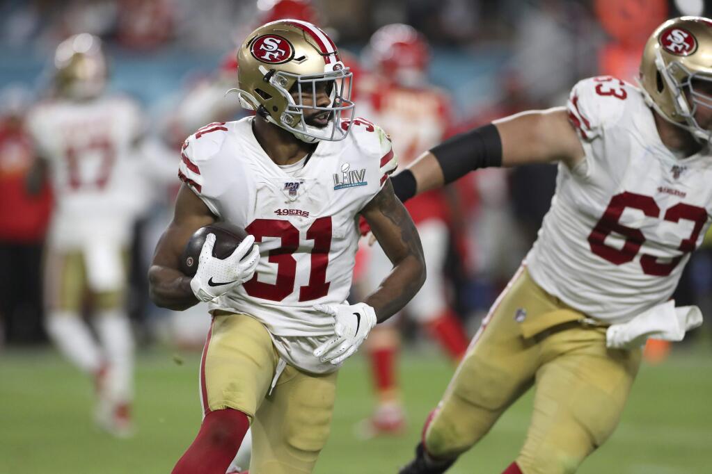 San Francisco 49ers running back Raheem Mostert rushes against the Kansas City Chiefs during Super Bowl LIV on Feb. 2, 2020, in Miami Gardens, Fla. The Chiefs won the game 31-20. (AP Photo/Gregory Payan)