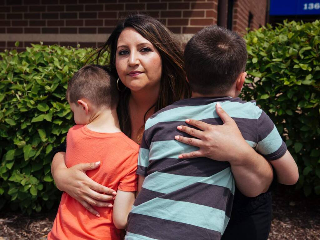 Danielle Rizzo with her boys, ages 6 and 7, in Streamwood, Ill. After finding out her sons were part of an autism cluster, she sued the sperm bank and its parent company. (TAYLOR GLASCOCK/ FOR THE WASHINGTON POST)