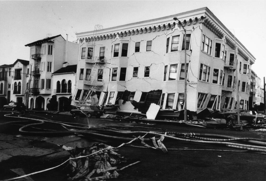 Cracks graze the surface of a Divisadero St. apartment building in San Francisco on Wednesday, October 18, 1989 after an earthquake hit the city on Tuesday. (Timothy Baker/The Press Democrat)