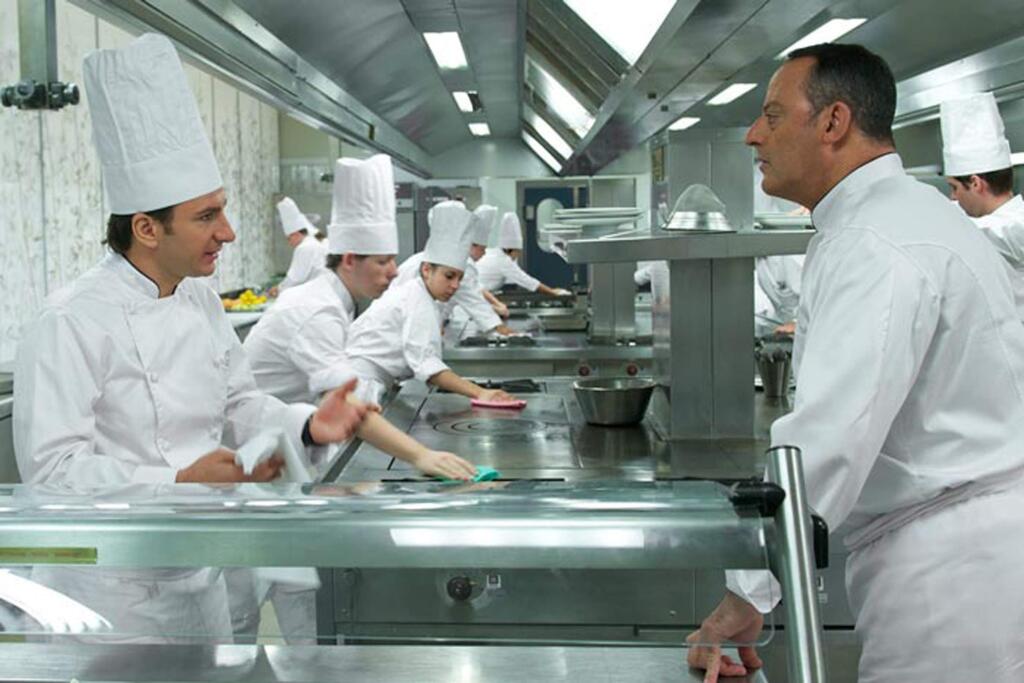 GaumontJean Reno, right, as legendary chef Alexandre Legarde, and Michaël Youn, left, as young acolyte chef Jacky Bonnot, in 'Le Chef.'