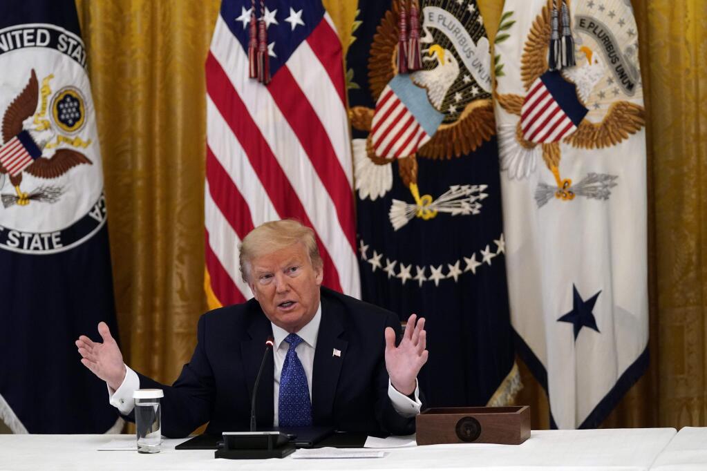 President Donald Trump speaks during a Cabinet Meeting in the East Room of the White House, Tuesday, May 19, 2020, in Washington. (AP Photo/Evan Vucci)