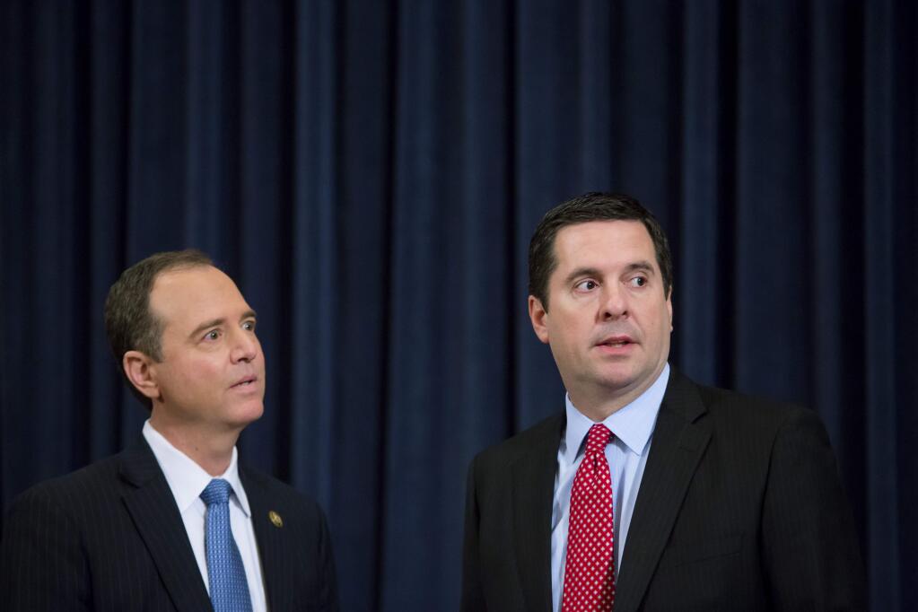 Rep. Adam Schiff, D-Burbank, and Rep. Devin Nunes, R-Tulare, issued opposing memos regarding the ongoing investigation of Russian meddling in the 2016 election. (ERIC THAYER / New York Times)