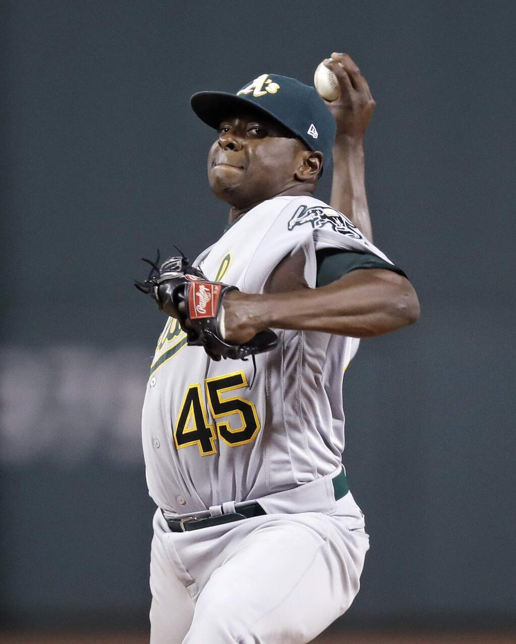 Oakland Athletics starting pitcher Jharel Cotton delivers during the first inning against the Boston Red Sox at Fenway Park in Boston, Wednesday, Sept. 13, 2017. (AP Photo/Charles Krupa)