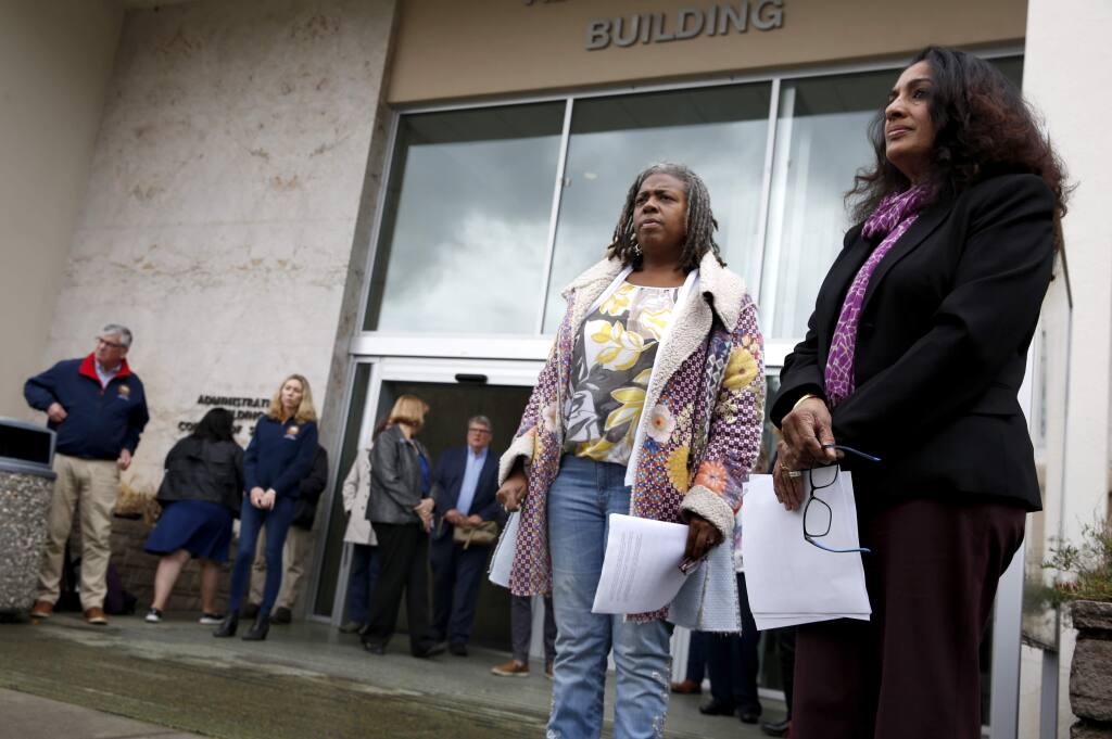 (FILE PHOTO) Dr. Sundari R. Mase, Health Officer for the County of Sonoma, right, and Barbie Robinson, the Director of the Department of Health Services, attend a press conference about the first community spread case of the coronavirus and the local response. Photo taken outside the Sonoma County administration building in Santa Rosa on Sunday, March 15, 2020. (BETH SCHLANKER/ The Press Democrat)