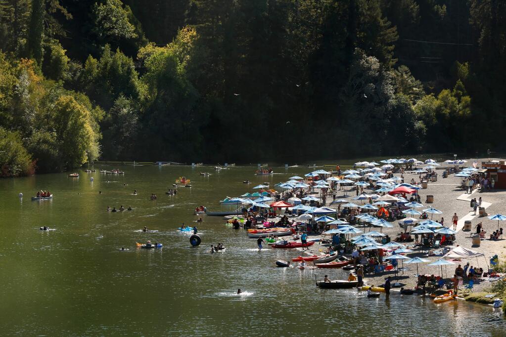 River-goers enjoy the sun and water at Johnson's Beach in Guerneville in 2015. (ALVIN JORNADA/ PD FILE)