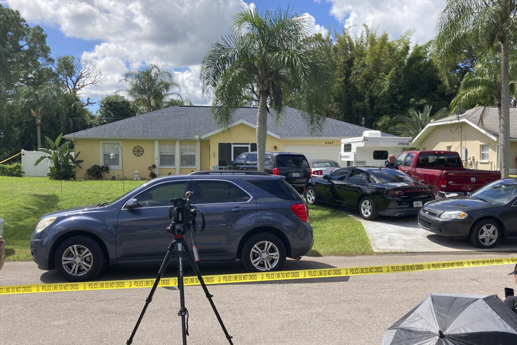 Police tape blocks off the home of Brian Laundrieâ€™s parents in North Port, Fla., Monday, Sept. 20, 2021. Laundrie, 23, was traveling on a cross-country road trip with Gabby Petito, 22, who went missing in August. Petitoâ€™s body was apparently discovered over the weekend at Grand Teton National Park. Laundrie is wanted for questioning, but has not been seen for several days. (AP Photo/Curt Anderson)