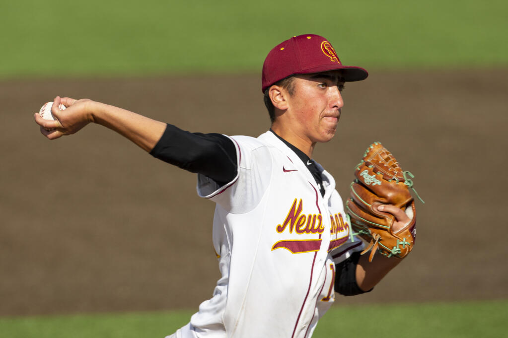 Cardinal Newman’s Jack Larson delivers a pitch in the 3rd inning during their championship game against San Marin at Cardinal Newman,  Friday May 27, 2022. (Chad Surmick / The Press Democrat)