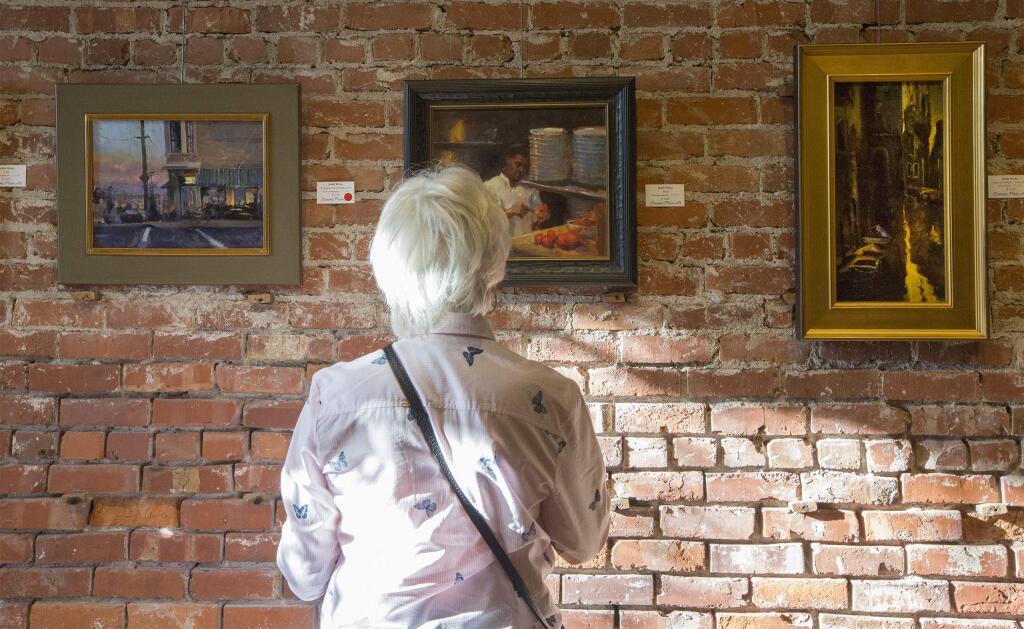 The work of painter Keith Wicks was featured at Bump Wine Cellars on Broadway. The first Sonoma Art Walk took place on Thursday, Sept. 6. All around the Plaza, local businesses and galleries joined in helping showcase local artisans. (Photo by Robbi Pengelly/Index-Tribune)