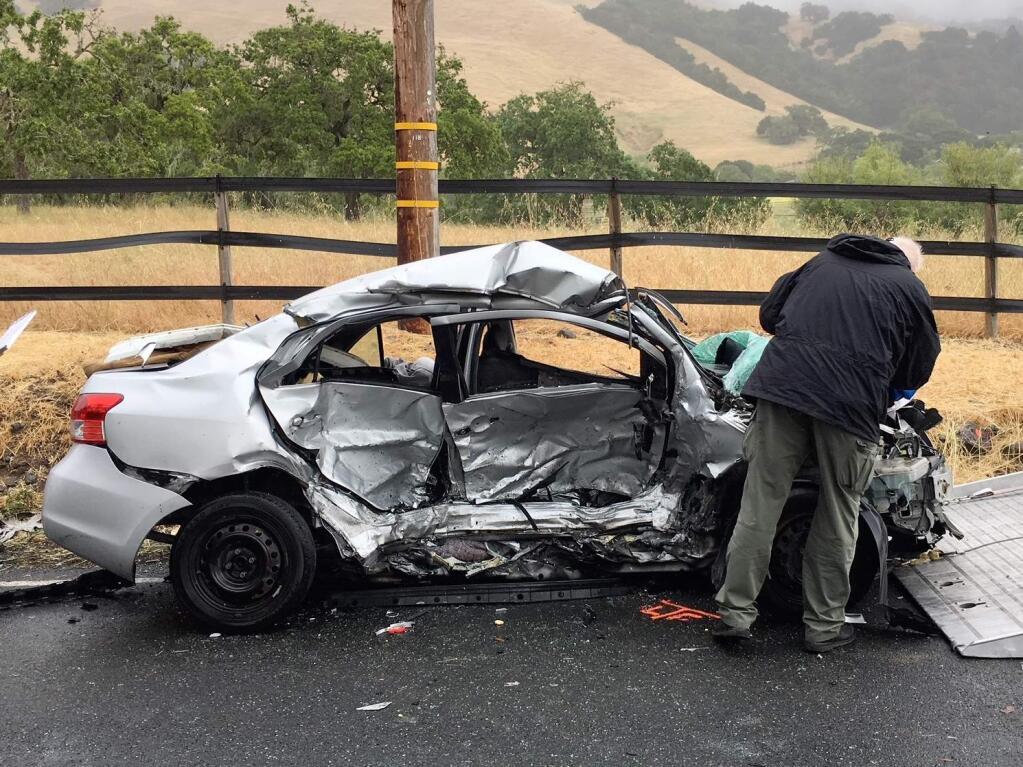 California Highway Patrol officers investigate the scene of a fatal accident on Bennett Valley Road close to Matanzas Creek Winery near Santa Rosa on Friday, May 25, 2018. (KENT PORTER/ PD)