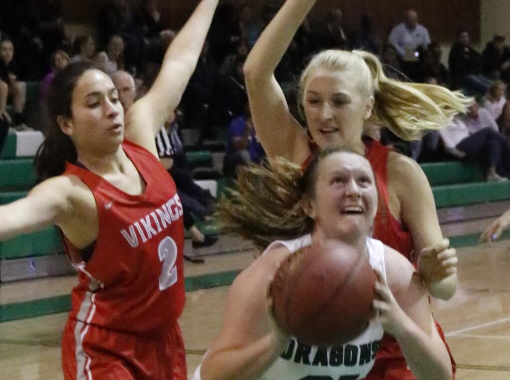 Bill Hoban/Special to the Index-TribuneSonoma's Annie Neles tries to put up a shot in a recent game against Montgomery. Neles and her Dragon teammates will be hosting the 23rd annual Dragon Classic this weekend.