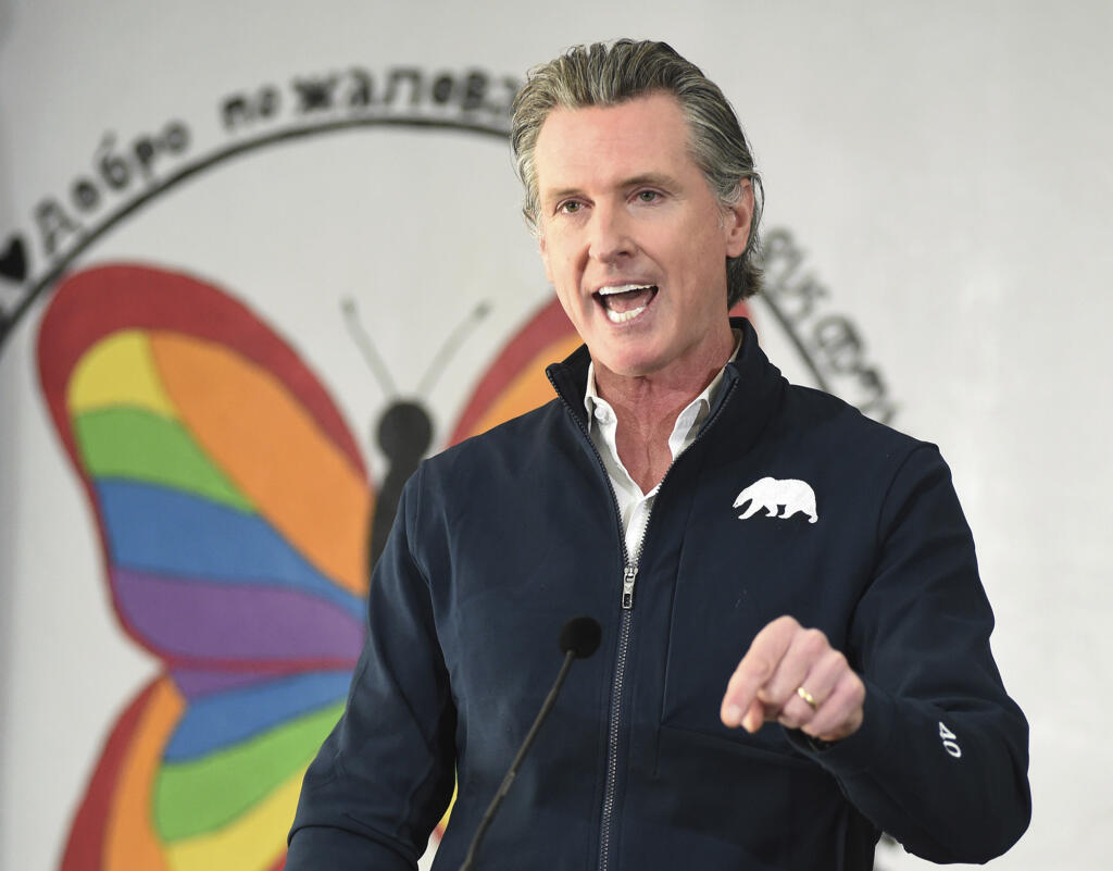 Governor Gavin Newsom speaks during a press conference Friday Feb. 26,2021, after visiting a Covid-19 vaccination clinic for farmworkers at the Dr. Sharon Stanley-Rea Community Center, in Fresno, California during a vaccination clinic for farmworkers.