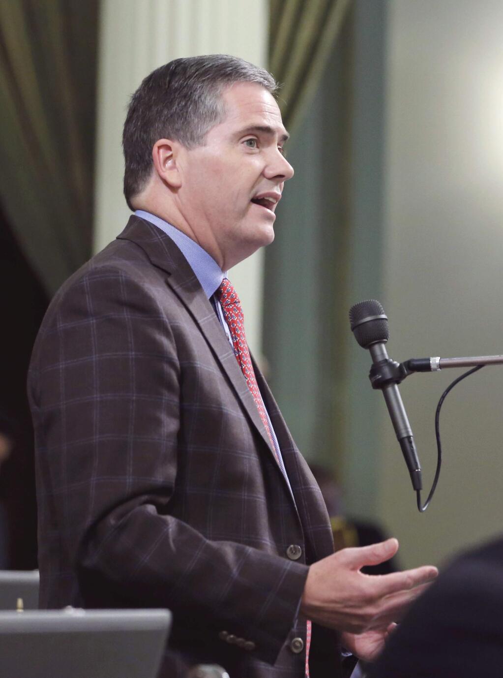 FILE - In this Aug, 15, 2016 file photo, Assemblyman David Hadley, R-Manhattan Beach, urges lawmakers in Sacramento, Calif., to approve a measure that would prevent California police from prematurely selling belongings seized from suspected criminals. (AP Photo/Rich Pedroncelli, File)