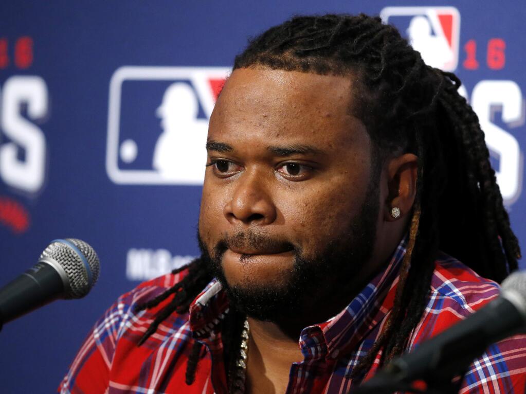San Francisco Giants starting pitcher Johnny Cueto listens to a question during a news conference Thursday, Oct. 6, 2016, in Chicago. The Giants are scheduled to face the Chicago Cubs in Game 1 of a baseball National League Division Series on Friday. (AP Photo/Nam Y. Huh)