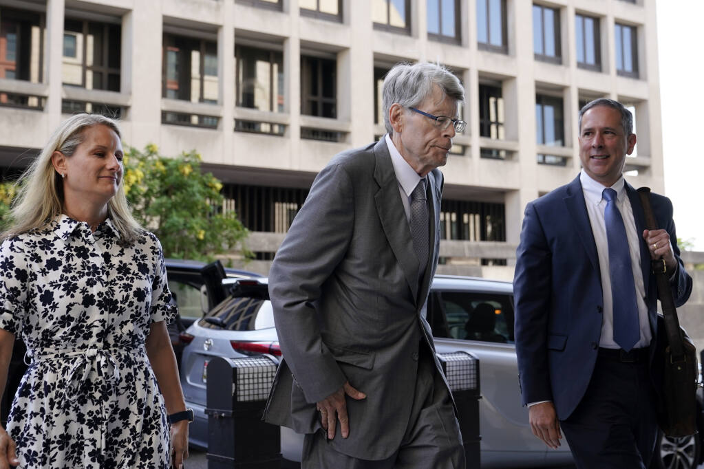 Author Stephen King arrives at federal court before testifying for the Department of Justice as it bids to block the proposed merger of two of the world's biggest publishers, Penguin Random House and Simon & Schuster, Tuesday, Aug. 2, 2022, in Washington. (AP Photo/Patrick Semansky)