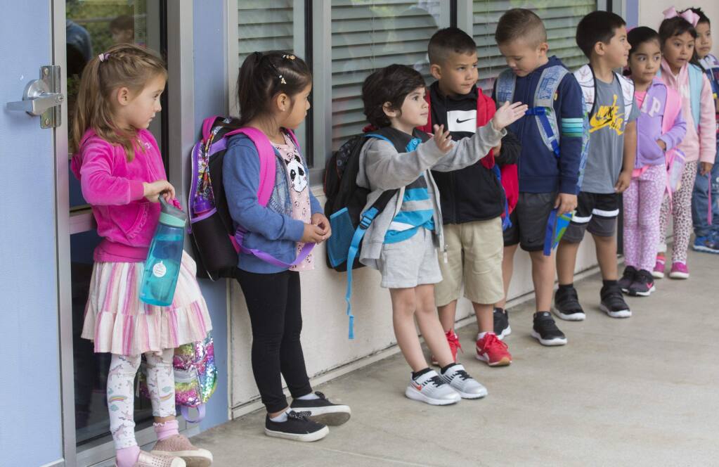 Students line up for a transitional kindergarten class at Sassarini Elementary School on Aug. 18, 2021. Sonoma Valley Unified School District is providing transitional kindergarten classrooms at Sassarini, El Verano and Prestwood elementary schools. (Photo by Robbi Pengelly/Index-Tribune)