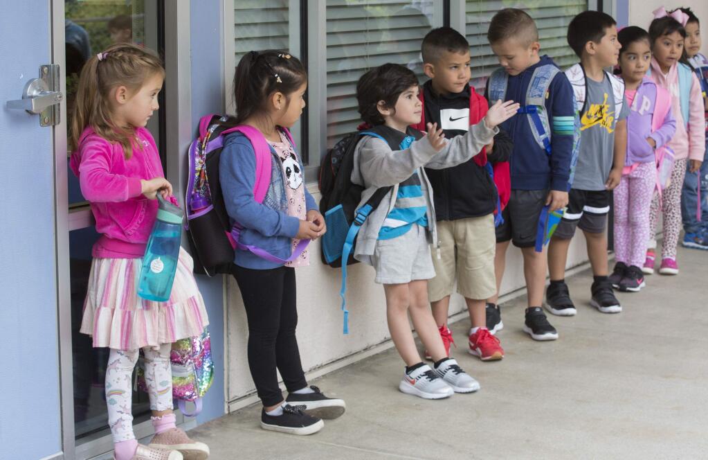Students line up for a transitional kindergarten class at Sassarini Elementary School on Aug. 18, 2021. Sonoma Valley Unified School District is providing transitional kindergarten classrooms at Sassarini, El Verano and Prestwood elementary schools. (Photo by Robbi Pengelly/Index-Tribune)