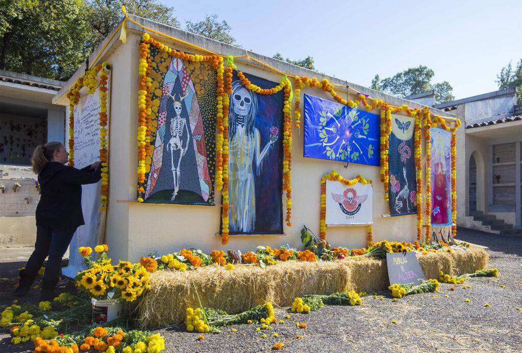 On Wednesday, Nov 1, the public altar was one of the 'Bouquets to the Dead' at the Sonoma Mountain Cemetery in observance of the Day of the Dead, a Mexican holiday that focuses on family and friends gathering to pray for family members who have passed. (Photo by Robbi Pengelly/Index-Tribune)