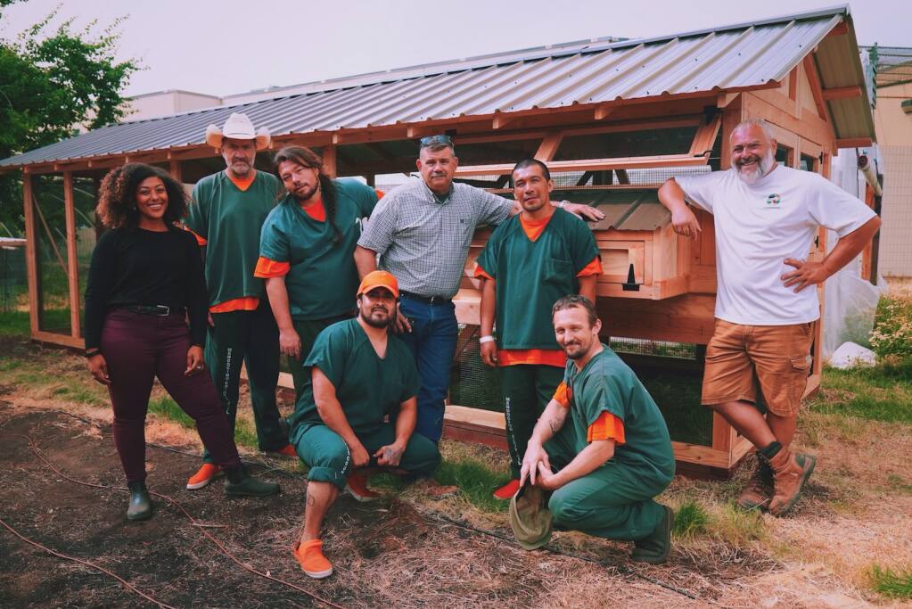 The garden crew, a group of inmates at Mendocino County Jail, worked with Carolina Coops founder Matt DuBoise and The Unconditional Freedom Project to build a large, brand new chicken coop in the prison yard. (Maya Gilbert / Unconditional Freedom Project)