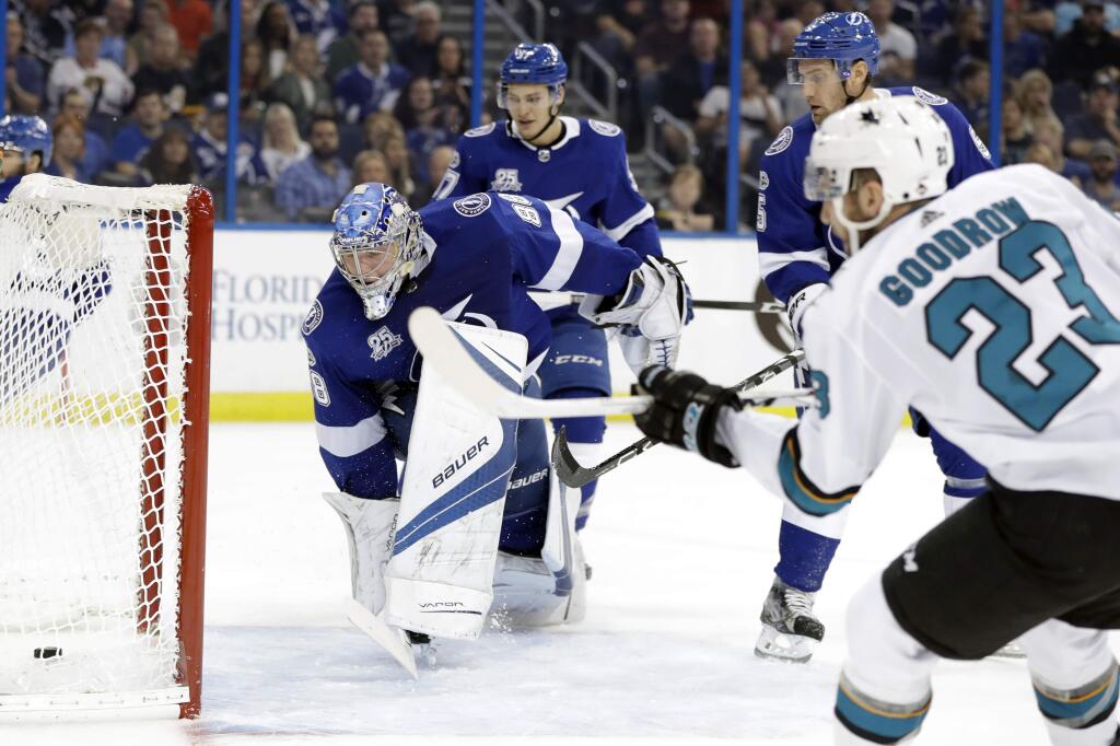 Tampa Bay Lightning goalie Andrei Vasilevskiy (88) cannot make the save on a goal by San Jose Sharks right wing Barclay Goodrow (23) during the first period of an NHL hockey game Saturday, Dec. 2, 2017, in Tampa, Fla. (AP Photo/Chris O'Meara)