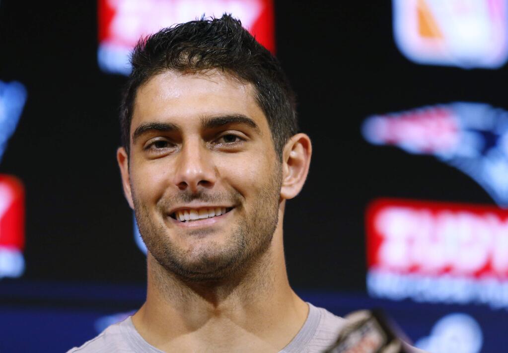 In this Thursday, Aug. 10, 2017 file photo, New England Patriots quarterback Jimmy Garoppolo speaks to the media following a preseason game against the Jacksonville Jaguars in Foxborough, Mass. On Monday, Oct. 30, 2017, the Patriots traded Garoppolo to the San Francisco 49ers for a 2018 draft pick. (AP Photo/Mary Schwalm, File)