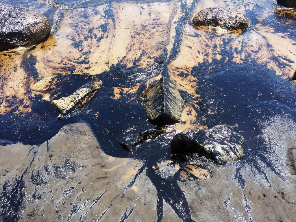 This photo provided by the Santa Barbara County Fire Department shows an oil slick from a broken pipeline that has created a slick in the ocean off the central California coast near Santa Barbara on Tuesday, May 19, 2015. Capt. Dave Zaniboni of the Santa Barbara County Fire Department says the pipeline on the land near Refugio State Beach broke Tuesday and spilled oil into a culvert that ran under the U.S. 101 freeway and into the ocean. (Mike Eliason/Santa Barbara County Fire Department via AP)