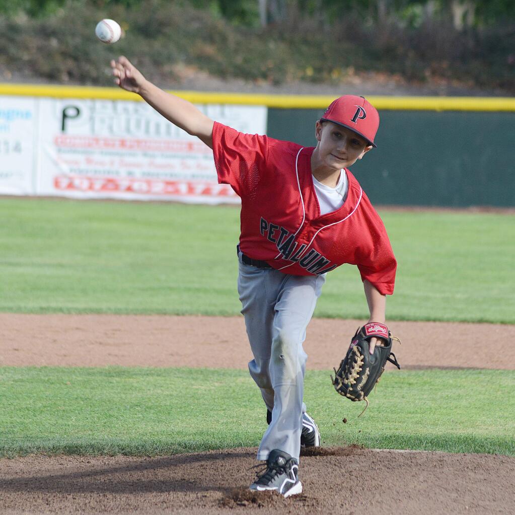 SUMNER FOWLER/FOR THE ARGUS-COURIERSpencer Norman pitched three shutout innings and hit two home runs, one a grand slam, to lead the Petaluma National Little League 10-11-year-old All-Stars to a 13-1 win over Napa.