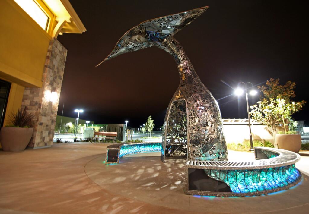 A 15-foot-tall whale tail, created from scrap metal by Sacramento artist Terrence Martin, was recently installed at the Deer Creek Village shopping center, the first development to include its own piece of art instead of paying into the city's Public Art Fund. (ALLISON JARRELL/ARGUS-COURIER STAFF)