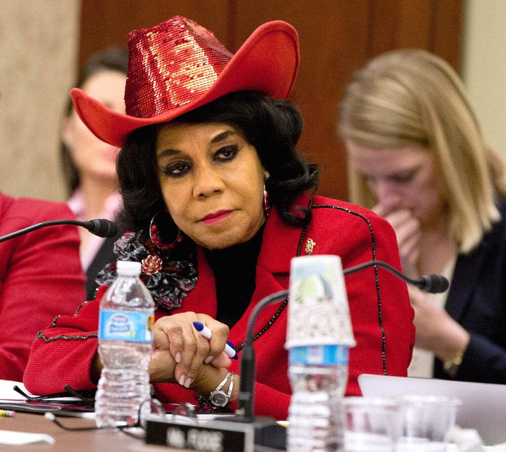 In this Nov. 18, 2015 file photo, House Education and the Workforce Committee member Rep. Frederica Wilson, D-Fla., attends a conference of House and Senate negotiators try to resolve competing versions of a rewrite to the No Child Left Behind education law, on Capitol Hill in Washington. Wilson says she was in the car with the widow of a slain soldier when she overheard President Donald Trump telling her in a phone conversation that he “knew what he signed up for.” (AP Photo/Jacquelyn Martin, File)