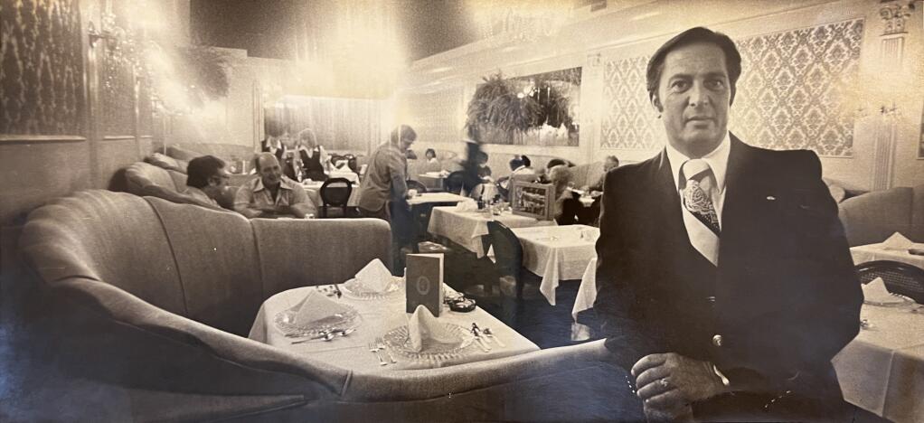 Owner Neil Blumenthal stands besides a booth in 1979 at the Topaz Room, a fine dining establishment downtown Santa Rosa that opened in 1945 and closed during the 1980s. Blumenthal become the restaurant’s owner in 1958 until its closure. (The Press Democrat)