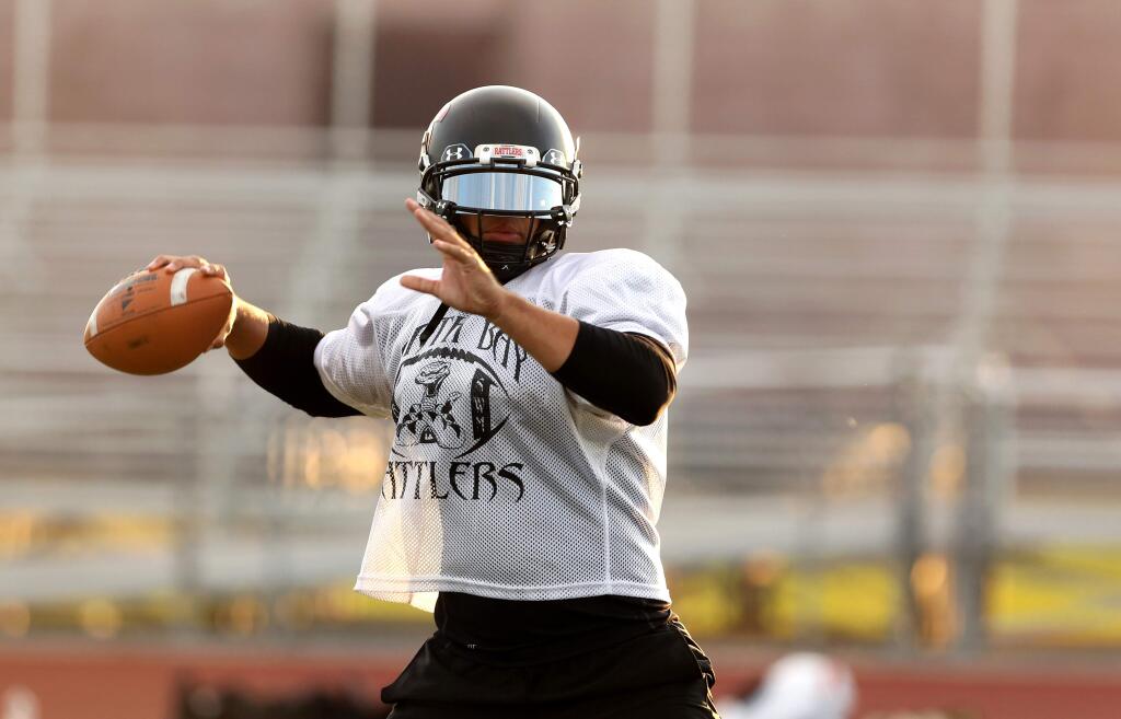 North Bay Rattlers quarterback Michael Nichols throws during practice at Piner High School, Tuesday, July 29, 2014. (Crista Jeremiason / The Press Democrat)