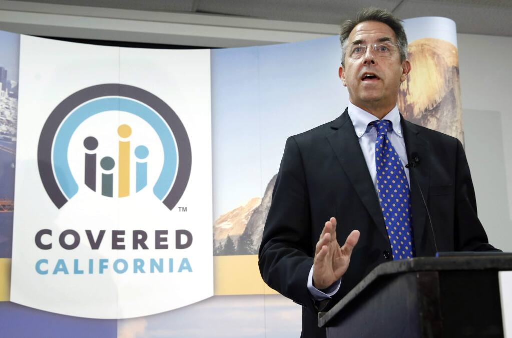 FILE - In this Nov. 13, 2013, file photo, Peter Lee, executive director of Covered California, the state's health insurance exchange, talks at a news conference in Sacramento, Calif. Monthly premiums will rise by an average of 8.7 percent next year for more than 1 million people in California who buy health insurance under former President Barack Obama's health care law. The rate increases announced Thursday, July 19, 2018, by Covered California are smaller than the double-digit increases seen in each of the last two years. (AP Photo/Rich Pedroncelli, File)