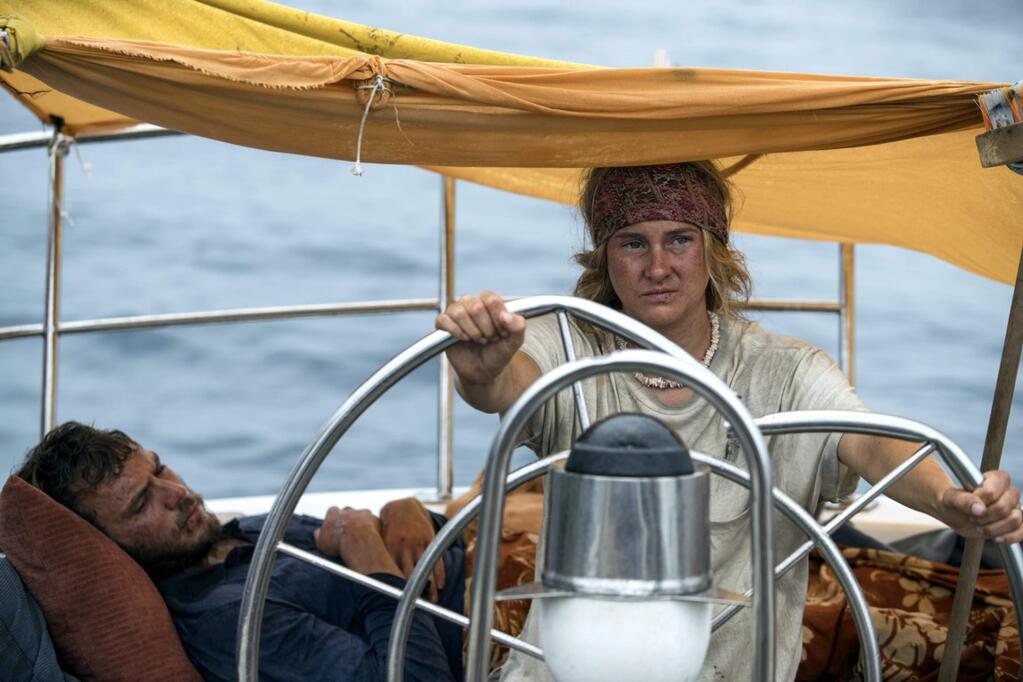 Shailene Woodley as Tami Oldham with Sam Claflin as Richard Sharp, two people sailing from Tahiti to San Diego who run into a catastrophic hurricane and try to survive after their 55-foot boat is wrecked in 'Adrift.' (STXfilms)