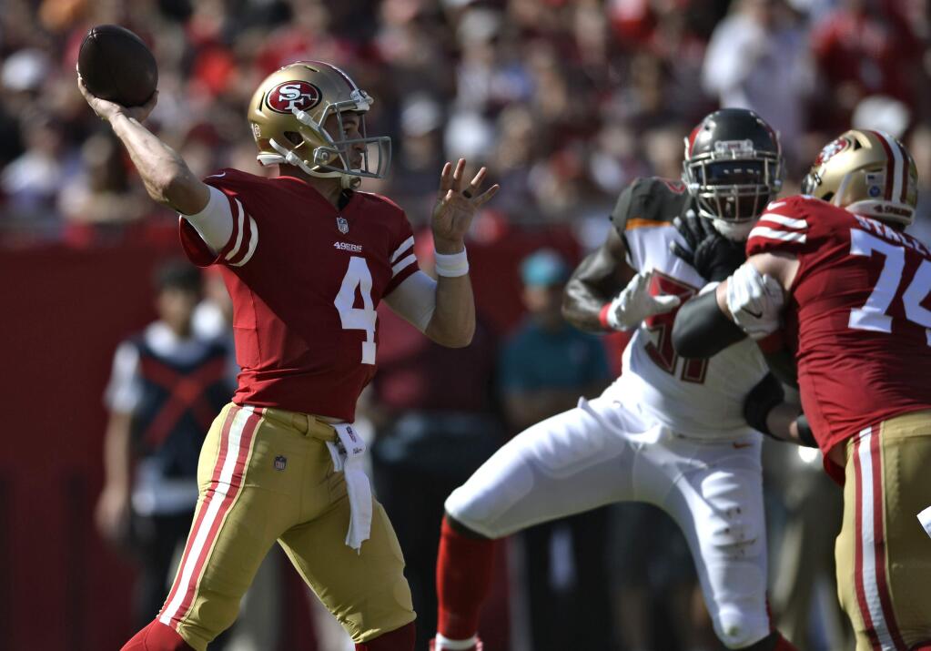 San Francisco 49ers quarterback Nick Mullens throws a pass against the Tampa Bay Buccaneers during the first half Sunday, Nov. 25, 2018, in Tampa, Fla. (AP Photo/Jason Behnken)