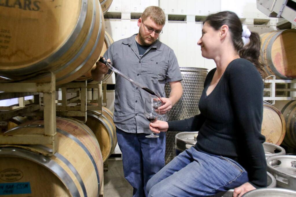 Michael & Lorraine Barber sample their wines in the winery where their wine is produced and stored in Santa Rosa on Tuesday, April 7, 2015. The Barbers are using a Kick Starter campaign to raise $20,000 to open a tasting room in Petaluma. (SCOTT MANCHESTER/ARGUS-COURIER STAFF)