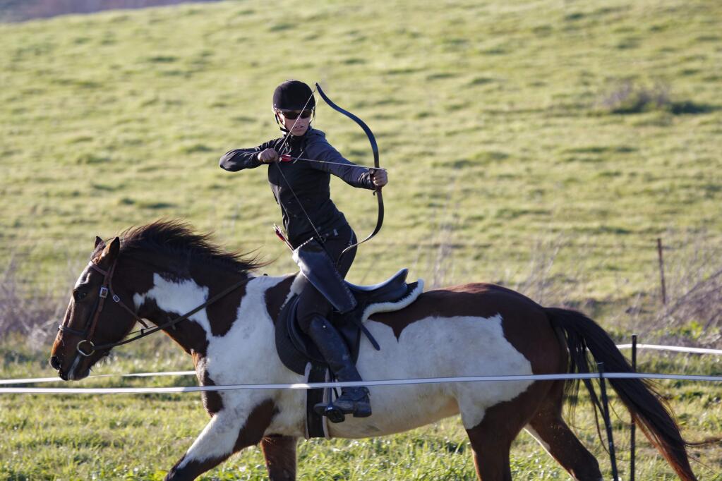 Petaluma, CA, USA. Thursday, December 29, 2016._ Hilary Rubicam Merrill, cofounder of California Centaurs, exhibits her skills as a horse archer. She trains and does workshops on a ranch in West Petaluma. (CRISSY PASCUAL/ARGUS-COURIER STAFF)
