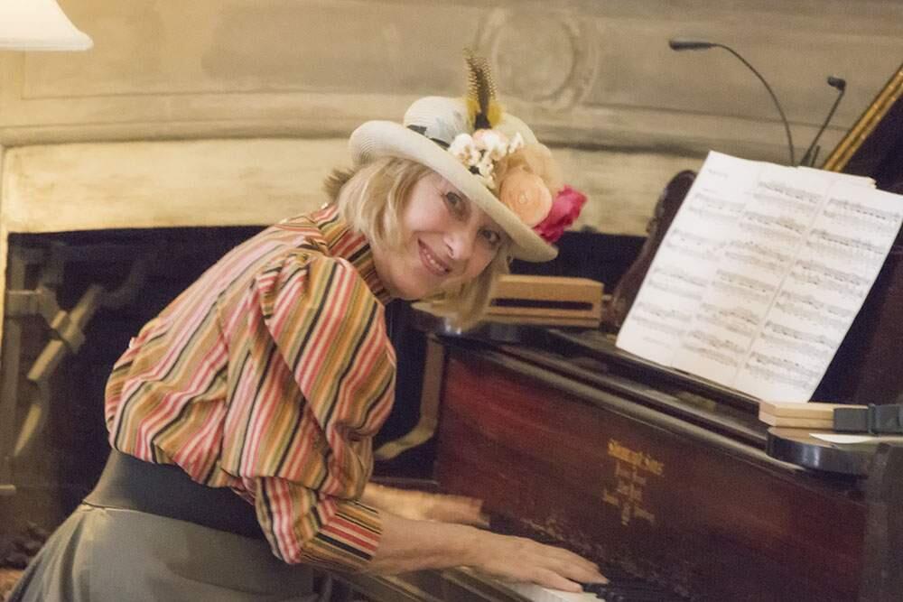 Debbie Knapp can't help but grin as she plays ragtime, which she will several times during the Wine Country Ragtime Festival in Napa and Sonoma, Nov. 10-12. (Submtted)