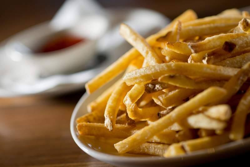 If you make French fries at home, you can cool, strain and store the neutral frying oil in a cool, dark place, then use it to make another batch or two before throwing it out. (Alvin Jornada /The Press Democrat)
