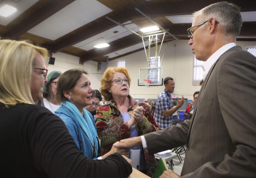 After a town hall meeting at the Cavanaugh Center, Congressman Jared Huffman greets some of those that attended. (CRISSY PASCUAL/ARGUS-COURIER STAFF)