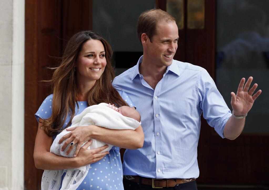 FILE - In this Tuesday, July 23, 2013 file photo, Britain's Prince William and Kate, Duchess of Cambridge hold their new born son George, as they pose for photographers outside St. Mary's Hospital exclusive Lindo Wing in London where the Duchess gave birth. (AP Photo/Lefteris Pitarakis, File)
