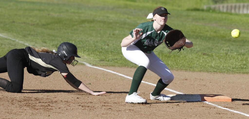 Bill Hoban/Index-TribuneSonoma first baseman Molly Brown awaits a pickoff throw in Wednesday's game against Windsor. The Lady Dragons used a six-run inning to top the Jaguars, 9-7.