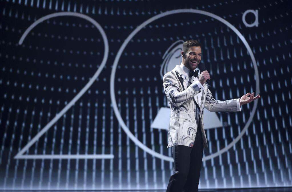 Host Ricky Martin speaks at the 20th Latin Grammy Awards on Thursday, Nov. 14, 2019, at the MGM Grand Garden Arena in Las Vegas. (AP Photo/Chris Pizzello)
